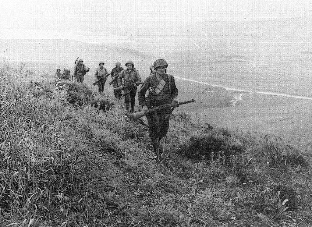 Soldiers from the 60th Infantry Regiment of the 9th Division, in the hills outside Bizerte on May 7, 1943, the day the port fell.