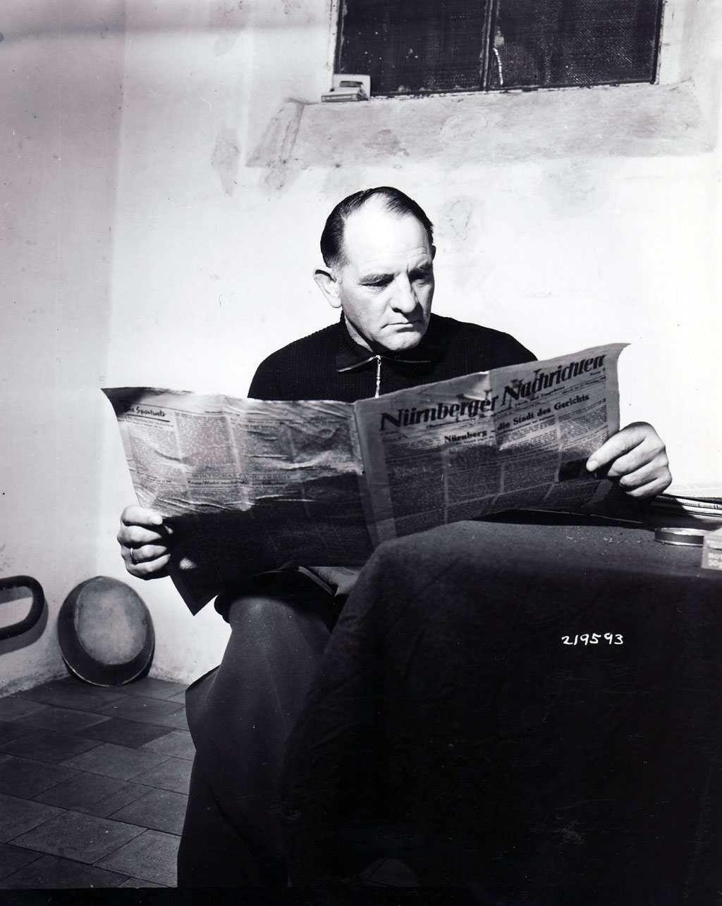 General Sepp Dietrich, the one-time butcher's apprentice and beer-hall brawler, commanded the Sixth Panzer Army. He is seen here in a Nuremberg jail cell, awaiting trial for war crimes in late 1945.