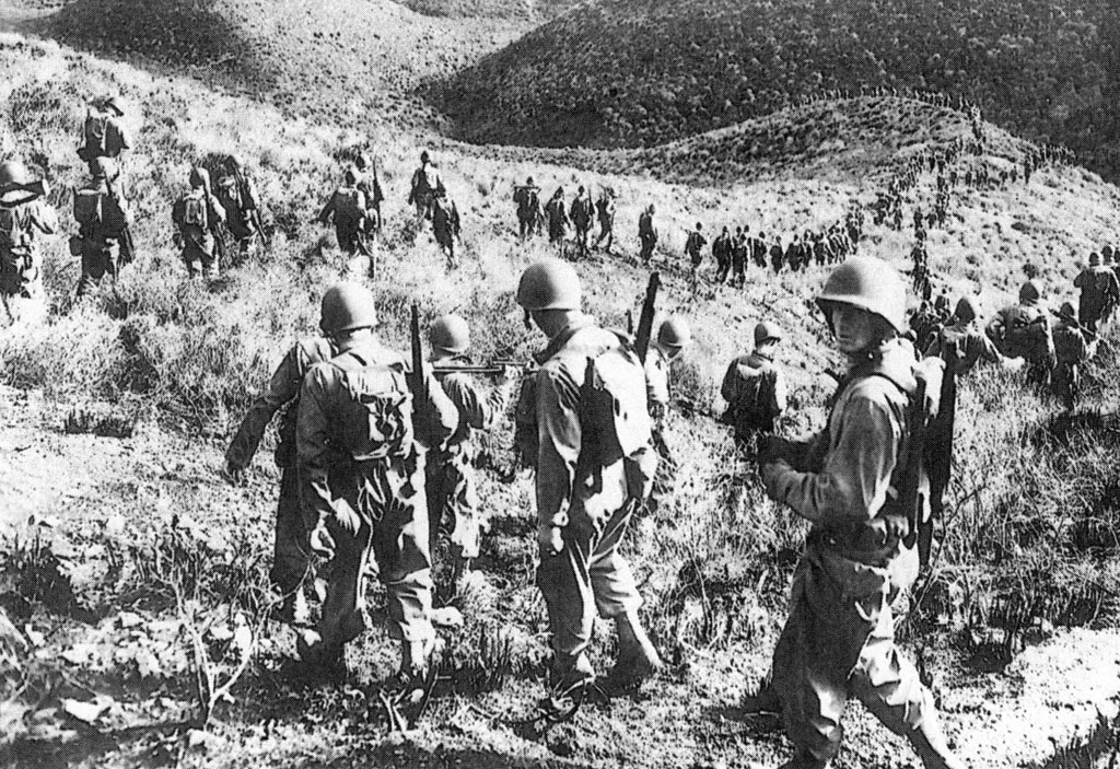 The 1st Ranger Battalion marching over hilly Algerian terrain in late January 1943.