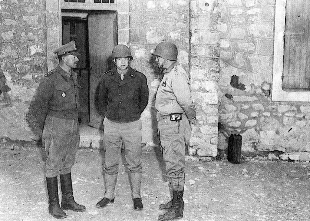 Field Marshal Harold Alexander (left), commander of the new 18th Army Group, with Eisenhower (center) and Patton during their first collective meeting, in Feriana, on March 17, 1943, the day the American attack began on Gafsa and El Guettar. 