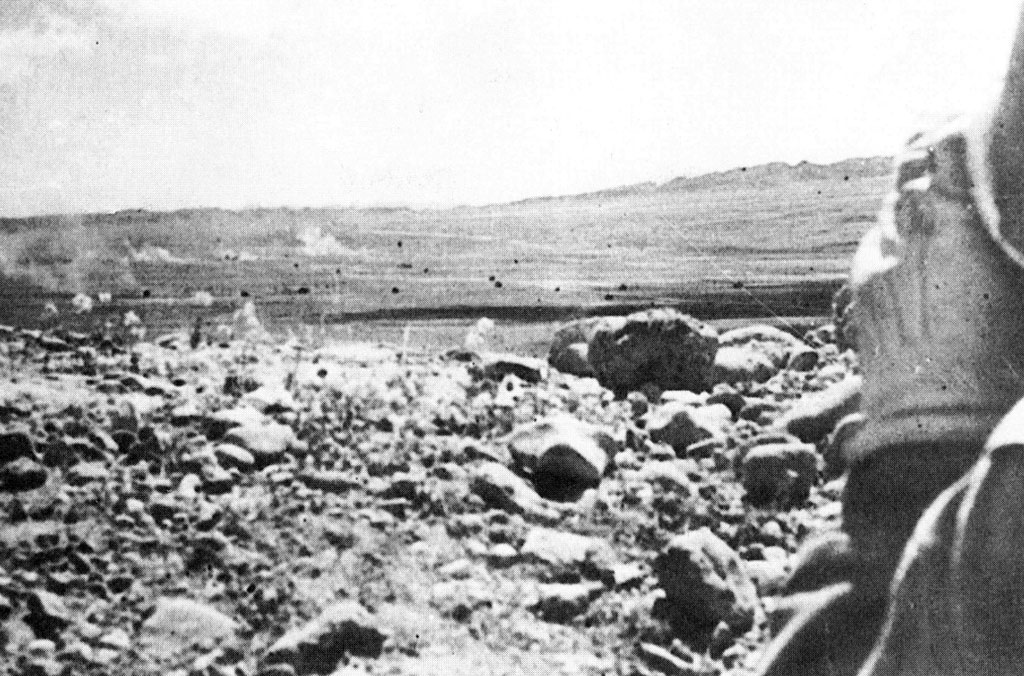 American artillery detonates around attacking German tanks of the 10th Panzer Division near El Guettar on April 23, 1943.